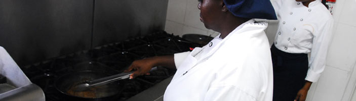 Trainees preparing dishes